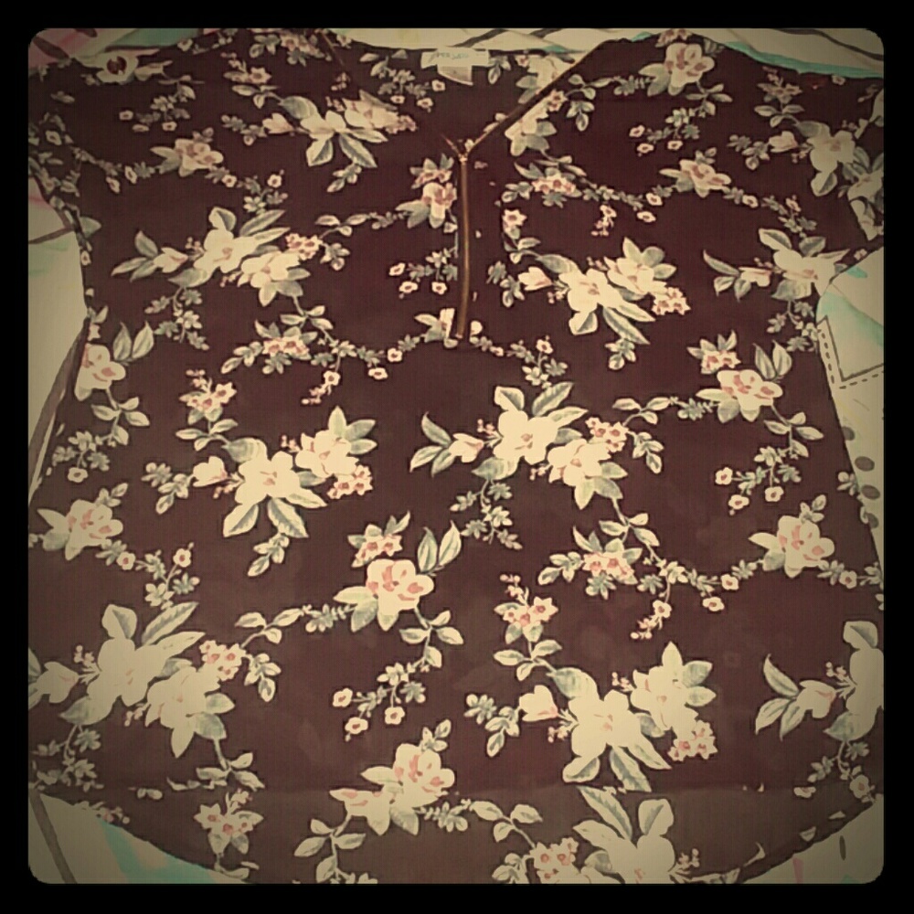 A Black shirt covered with flowers